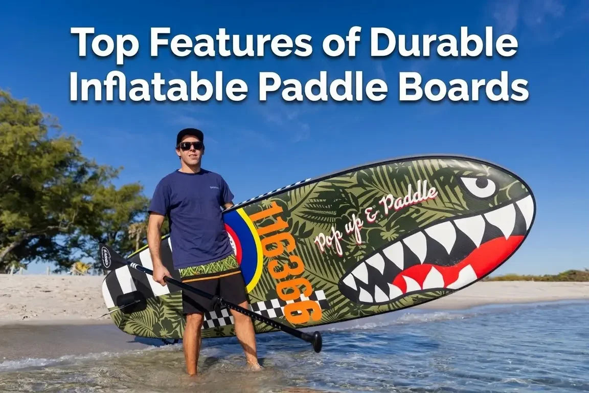 Man holding a durable inflatable paddle board on the beach highlighting key features