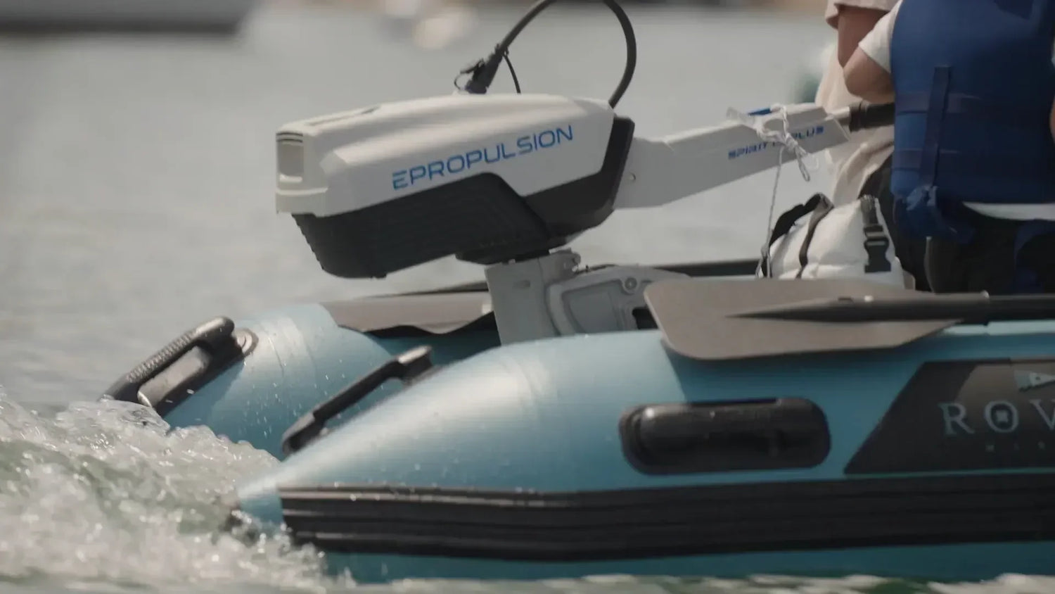 ePropulsion electric outboard mounted on a Rover Marine inflatable boat in motion.