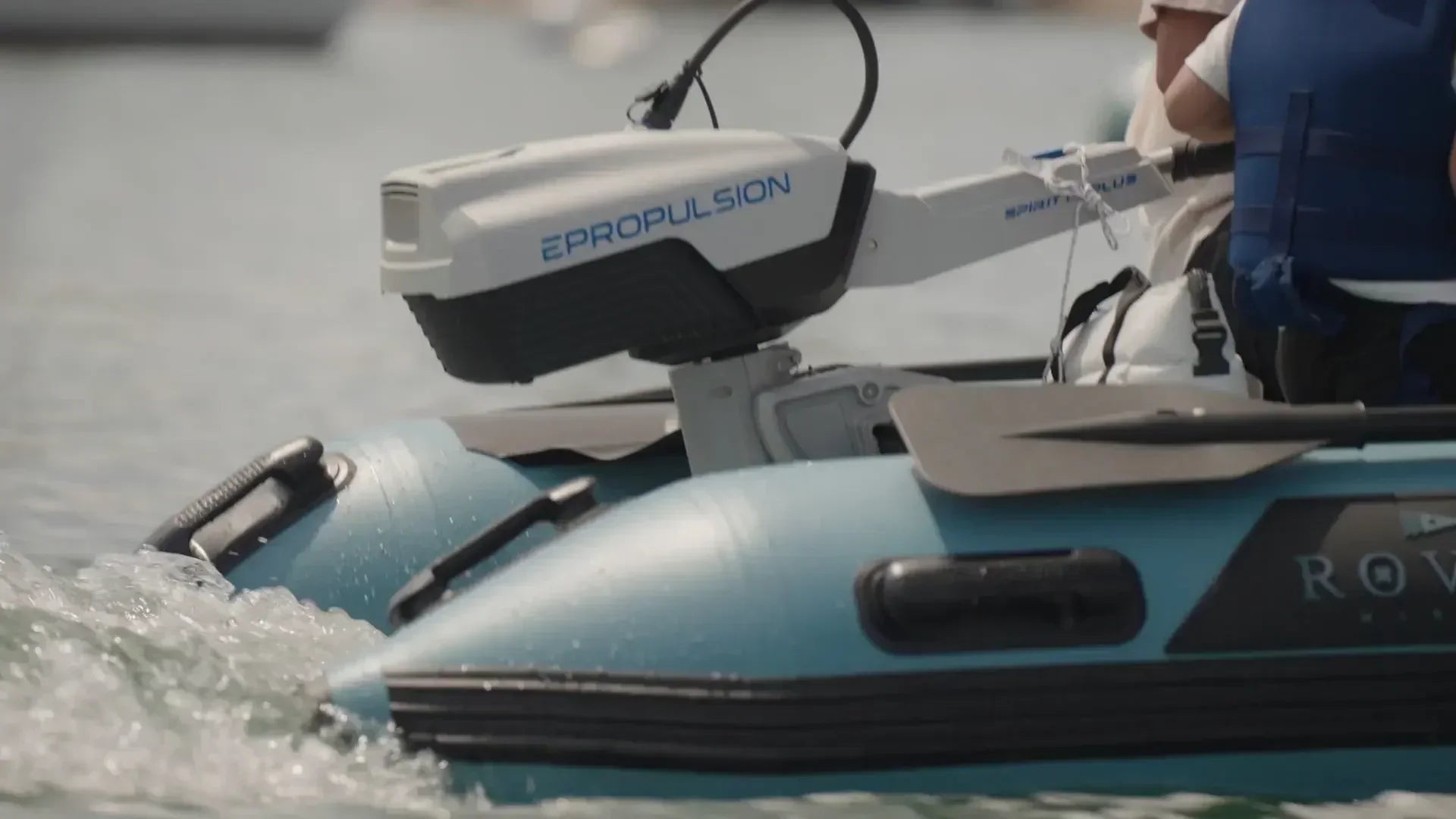 ePropulsion electric outboard mounted on a Rover Marine inflatable boat in motion.