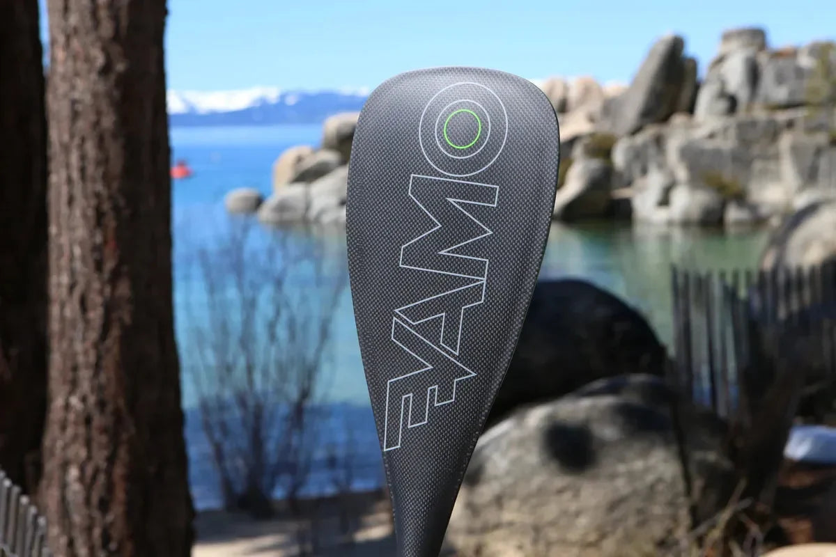 Close-up of Vamo carbon fiber paddle blade with logo for stand up paddleboards.