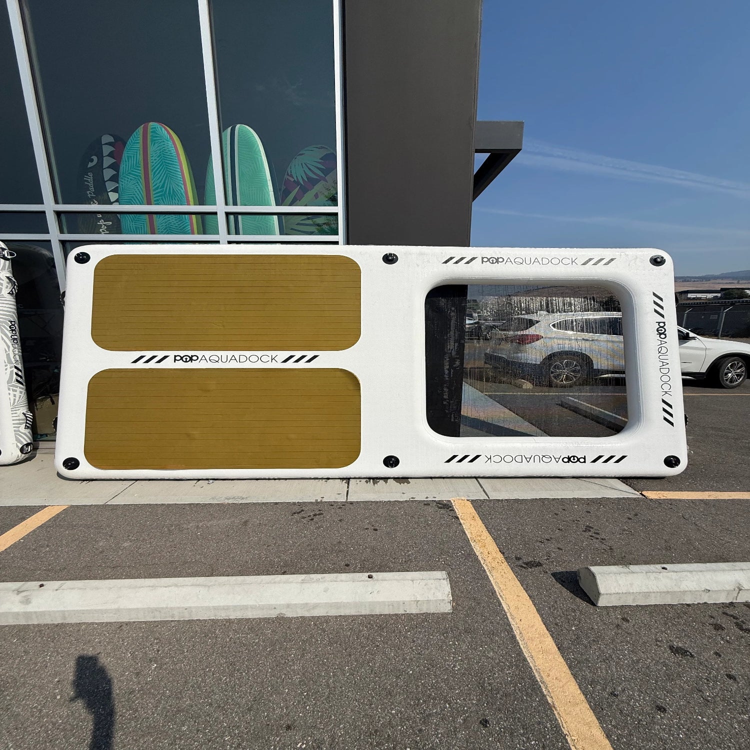 Green Program POPUP AQUADOCK 14x7 inflatable floating platform showcasing traction peeling, a small hole in the net, and minor dirt.