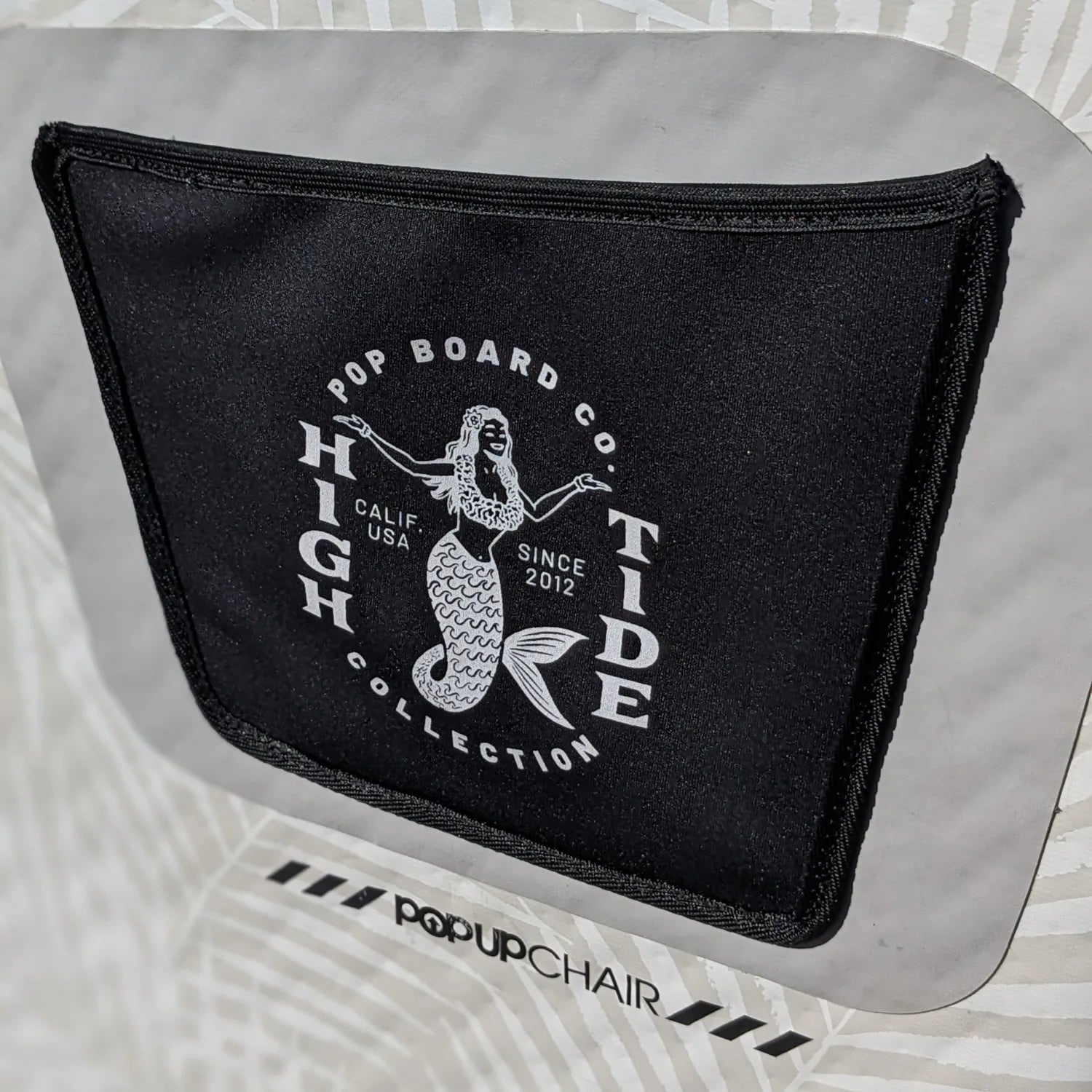 POP Up Chair inflatable chair pocket with High Tide collection mermaid logo.