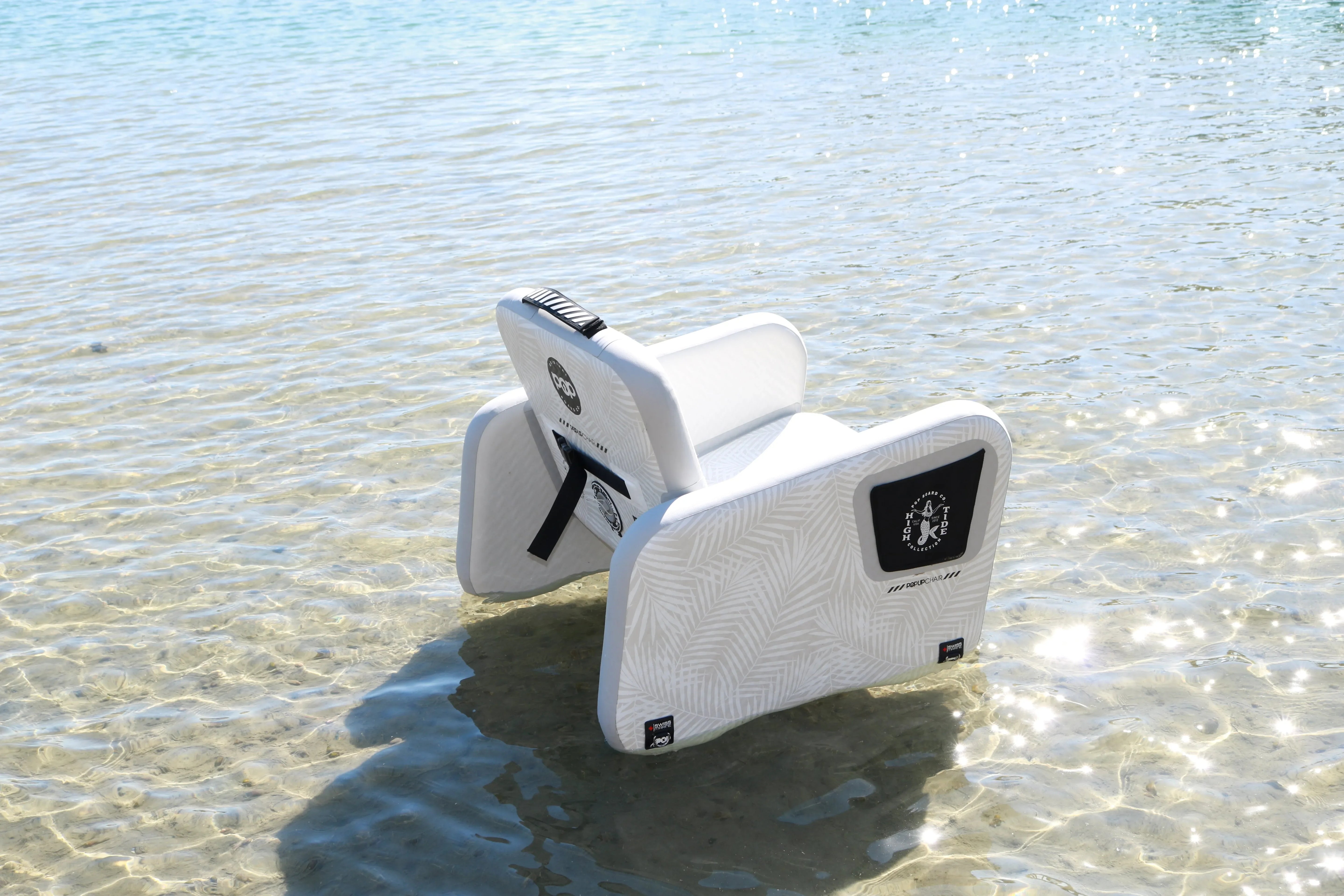 Inflatable POP Up Chair floating near the shoreline, showing water-ready design.
