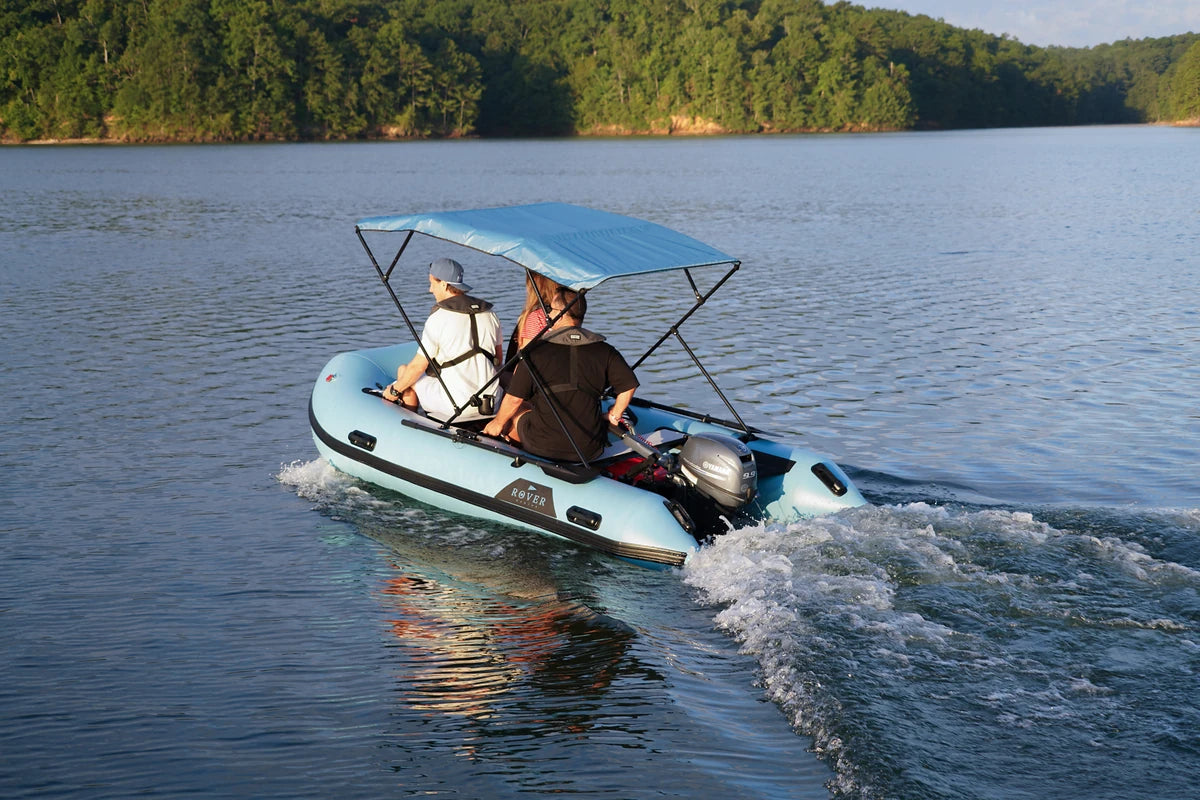 Group cruising in the 12 ft Rover Marine Battle Boat under a Bimini top, sold separately