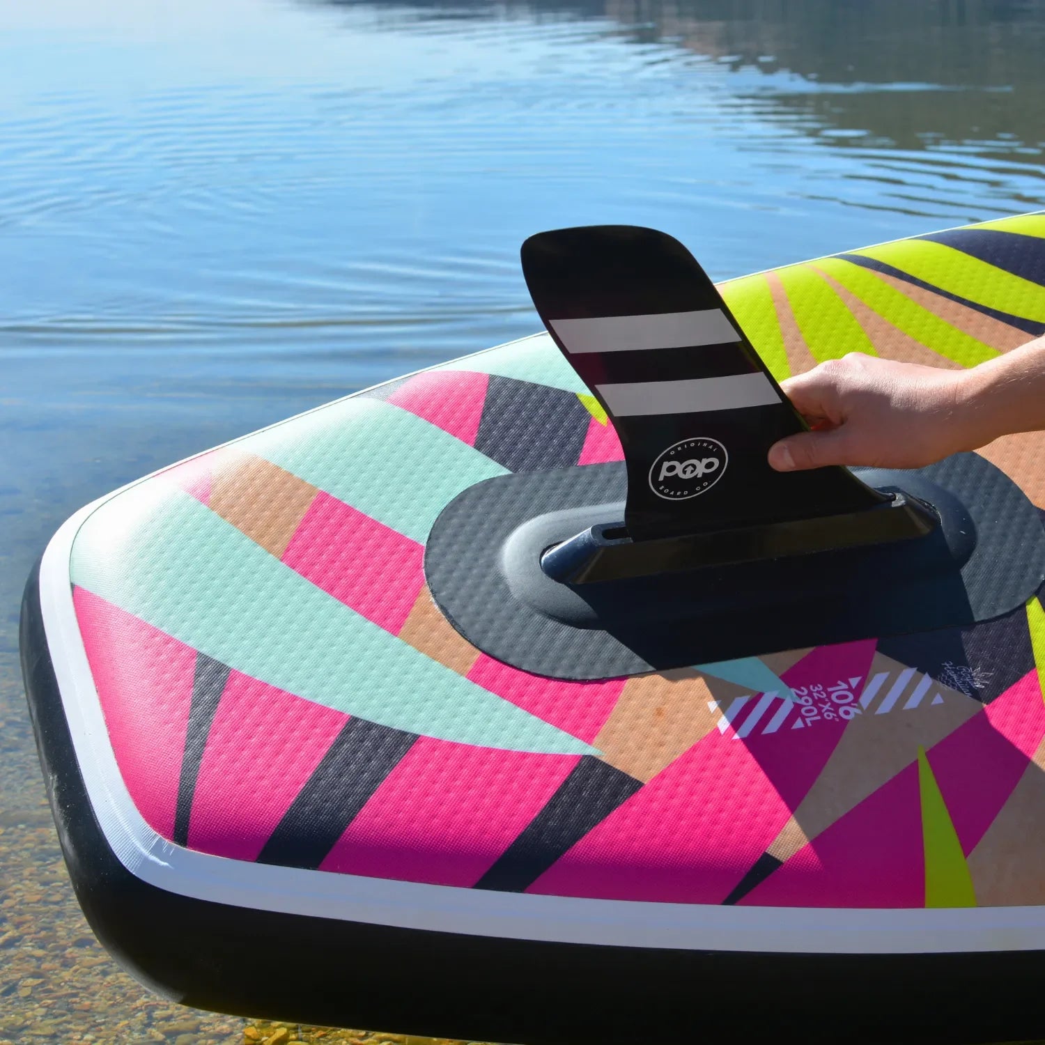 Close-up of removable fin system on POP Royal Hawaiian 10’6 inflatable paddleboard.