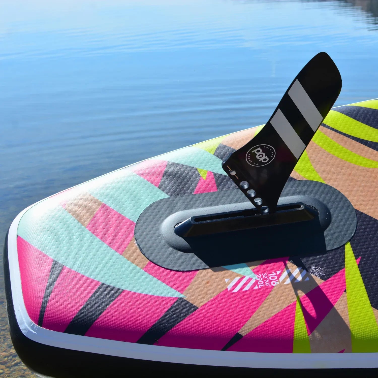 Fin installation view of the POP Royal Hawaiian 10’6 inflatable paddleboard 2024 model.