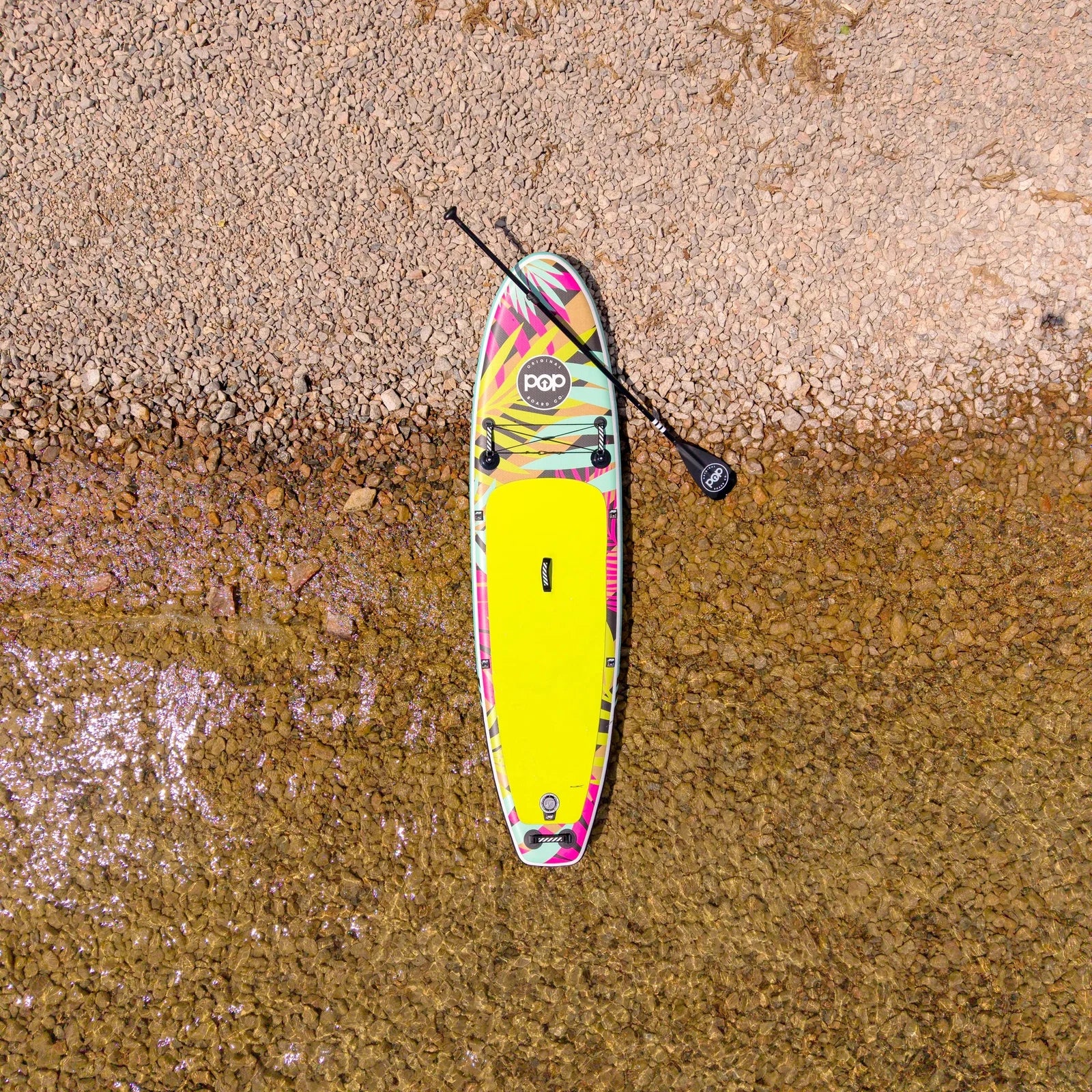 POP 10'6 Royal Hawaiian inflatable paddleboard on the lake shore, from above