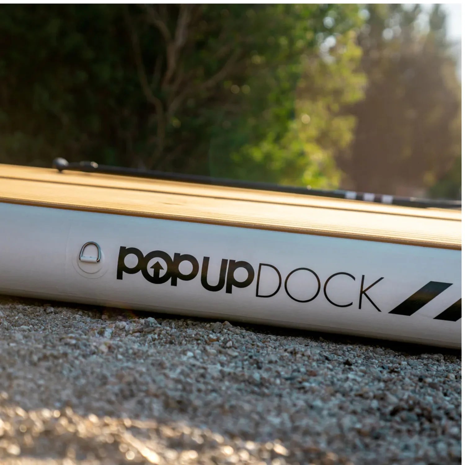 Close-up of POP Up Dock logo and durable PVC seams on a used dock from the Green Program.