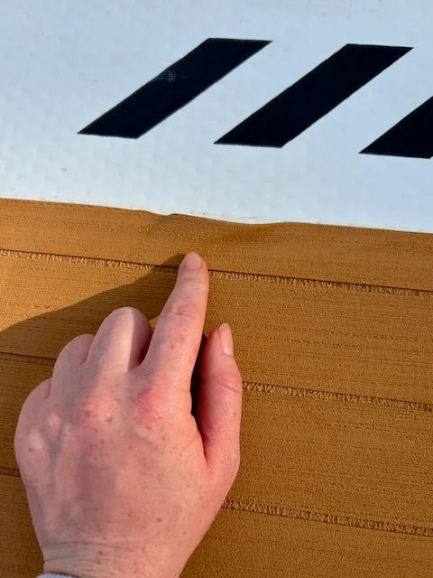 Edge detail of used POP Up Dock traction surface under warranty.