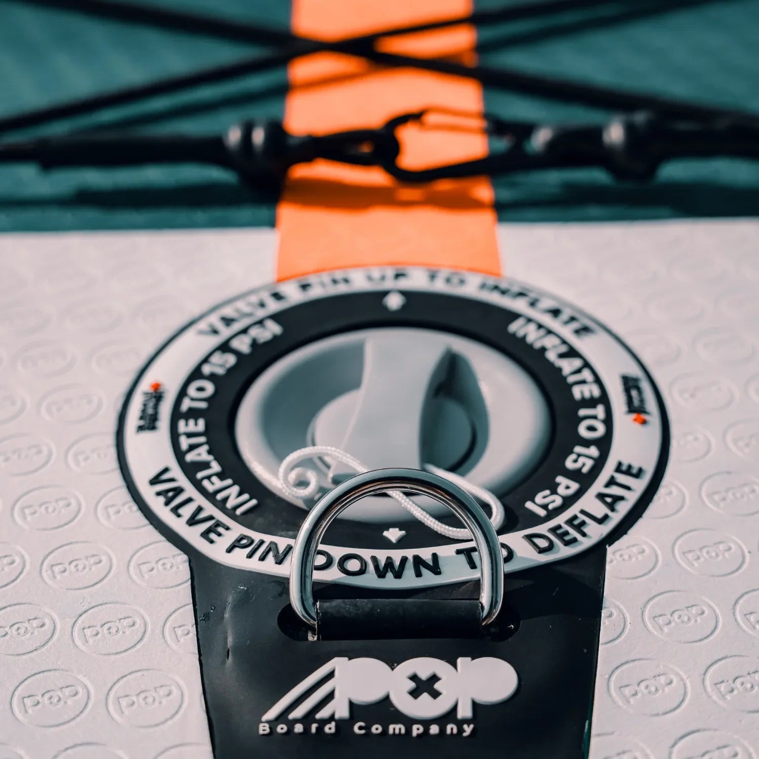 Bungee storage system close-up on POP Yacht Hopper 11'0 inflatable paddleboard.