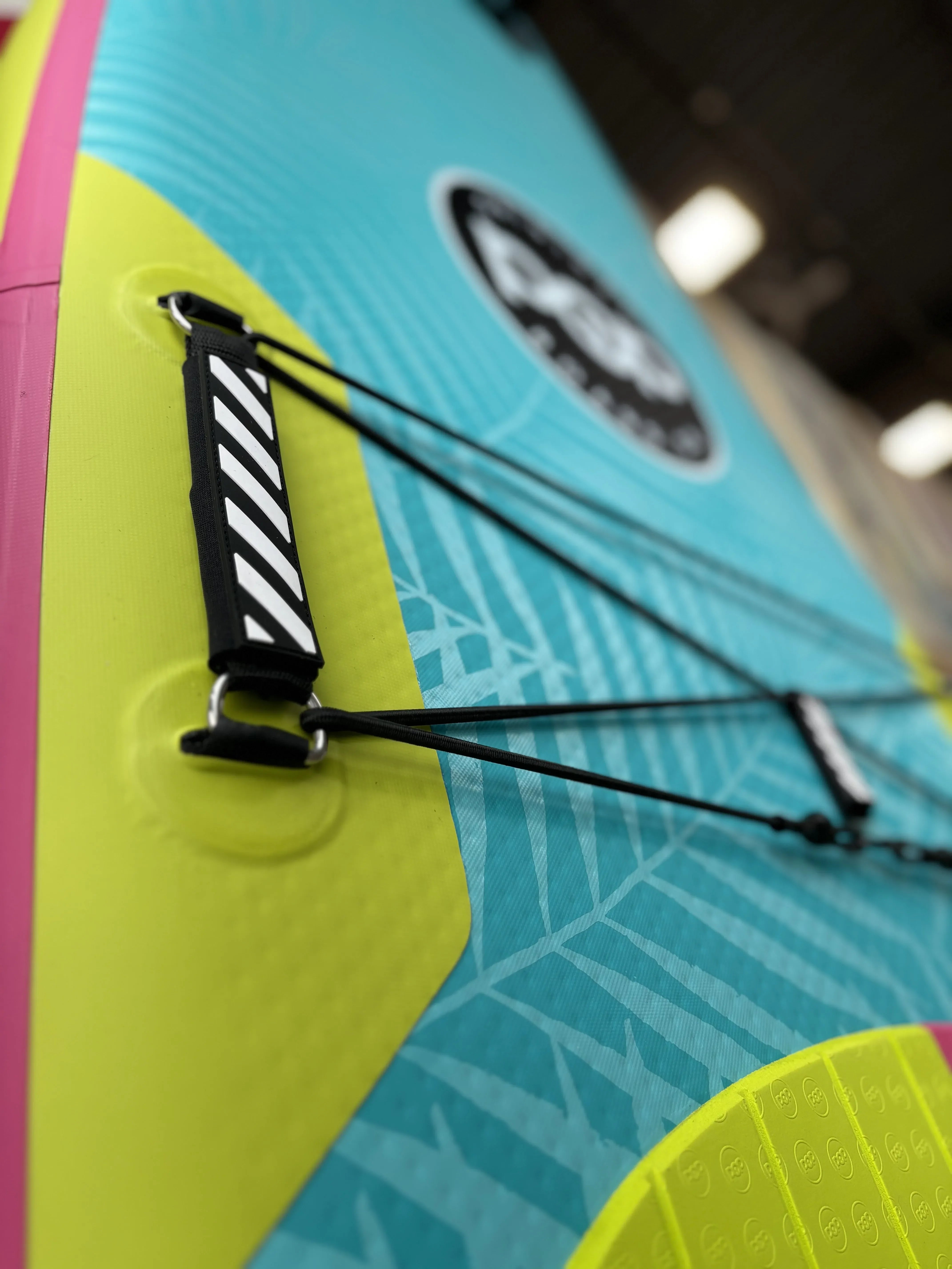 Center carry handle close-up on POP Yacht Hopper 11'0 inflatable paddleboard.