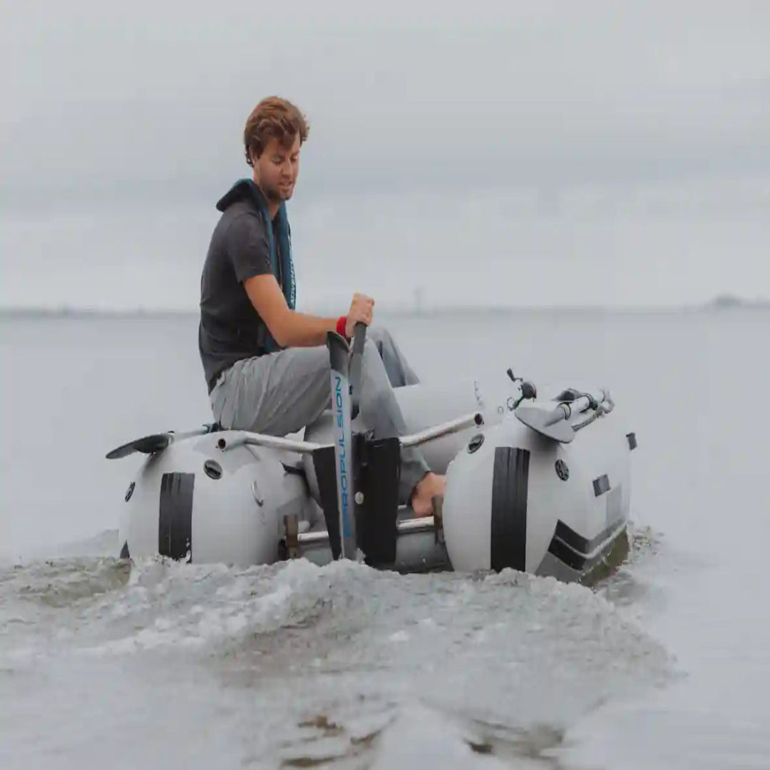 Person on a small inflatable boat in a body of water