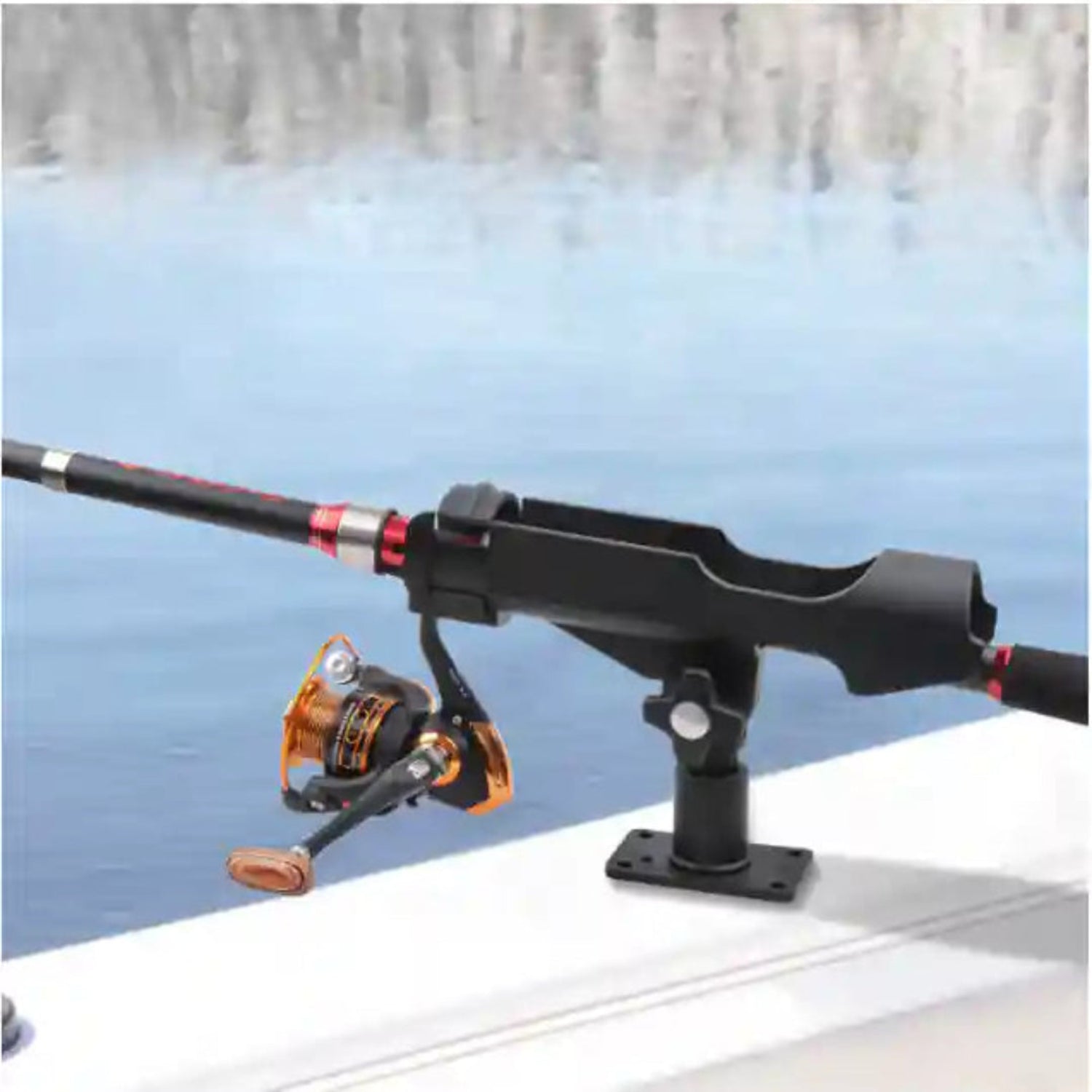 Fishing rod with reel on a boat deck by a body of water
