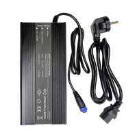 Black power adapter with cable on a white background