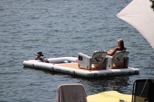 Owners lounging in POP Up Chairs on the AquaDock