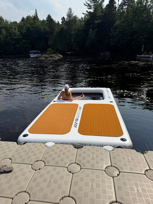 Owner relaxing in the AquaDock net lounger