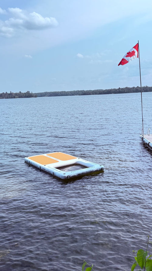 AquaDock floating on a calm lake