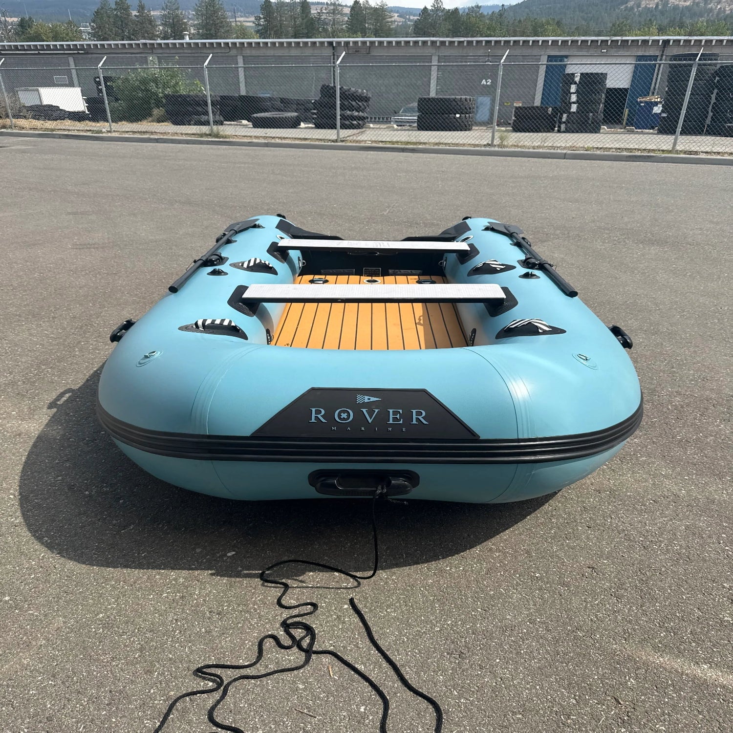 Green Program Rover Marine Battle Boat 12ft inflatable dinghy showcasing minor hull scuffs.