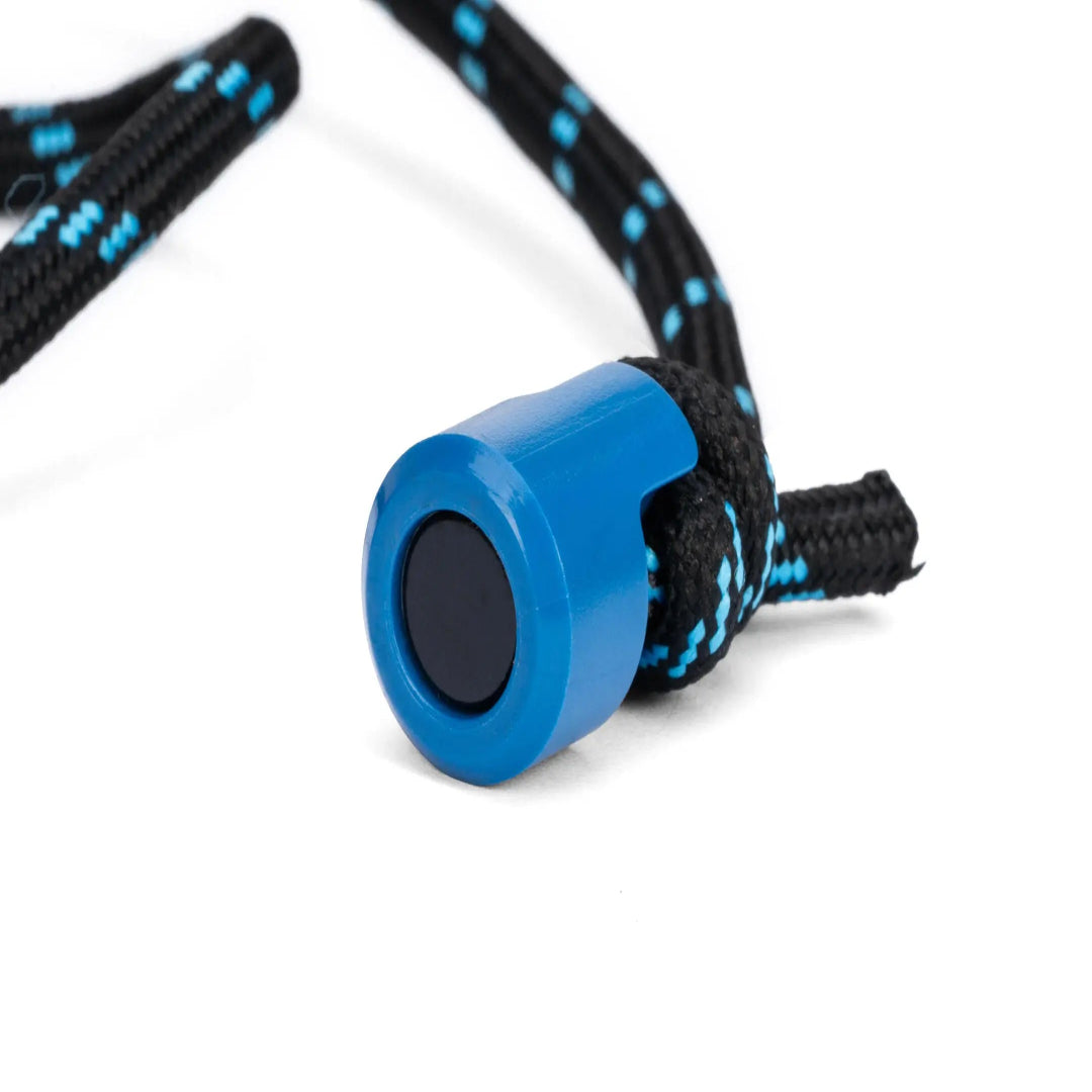 Blue cylindrical device with black center on a black and blue braided cord against a white background