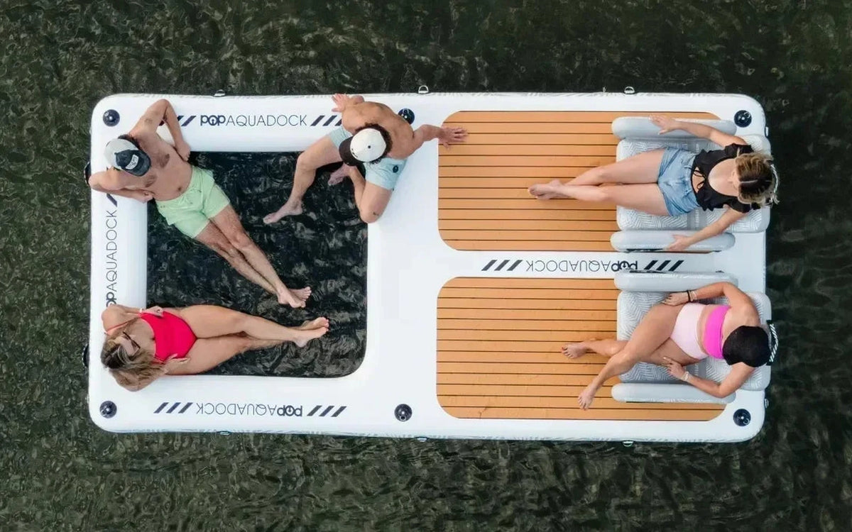 Top-down view of the 14 x 7 ft POP AquaDock with four adults and two POP Up Chairs on board