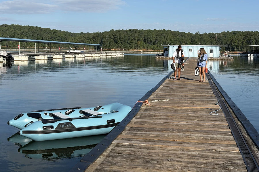 10 ft Rover Marine Battle Boat tied up alongside a wooden dock