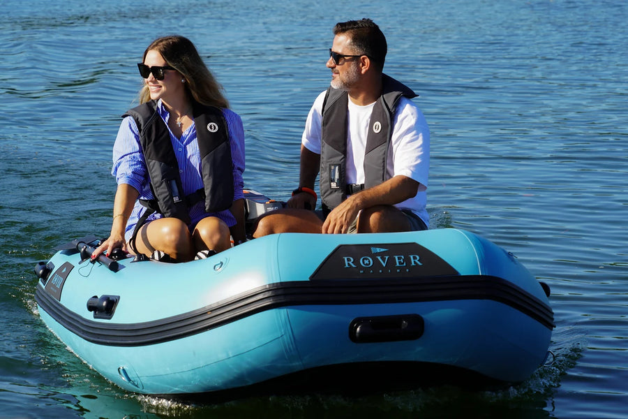 Couple in the 10 ft Rover Marine Battle Boat inflatable dinghy, front view