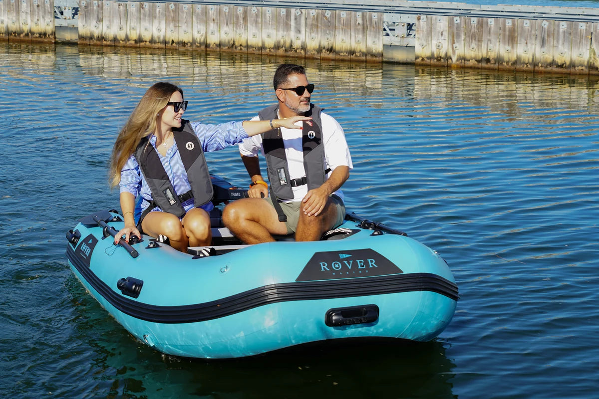 Smiling couple out on the lake in the 10 ft Rover Marine Battle Boat
