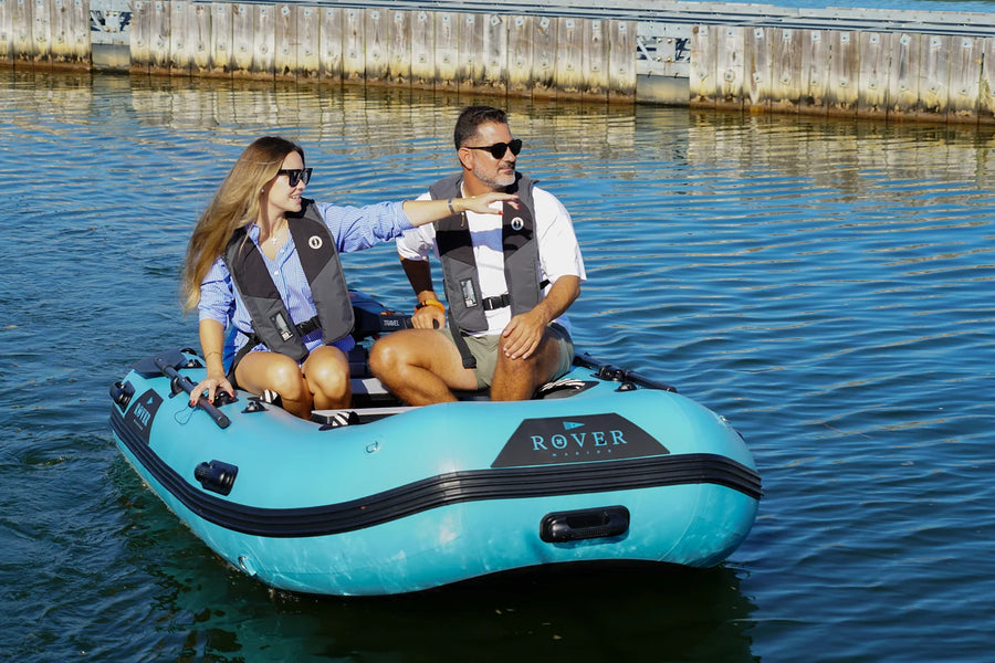 Smiling couple out on the lake in the 10 ft Rover Marine Battle Boat