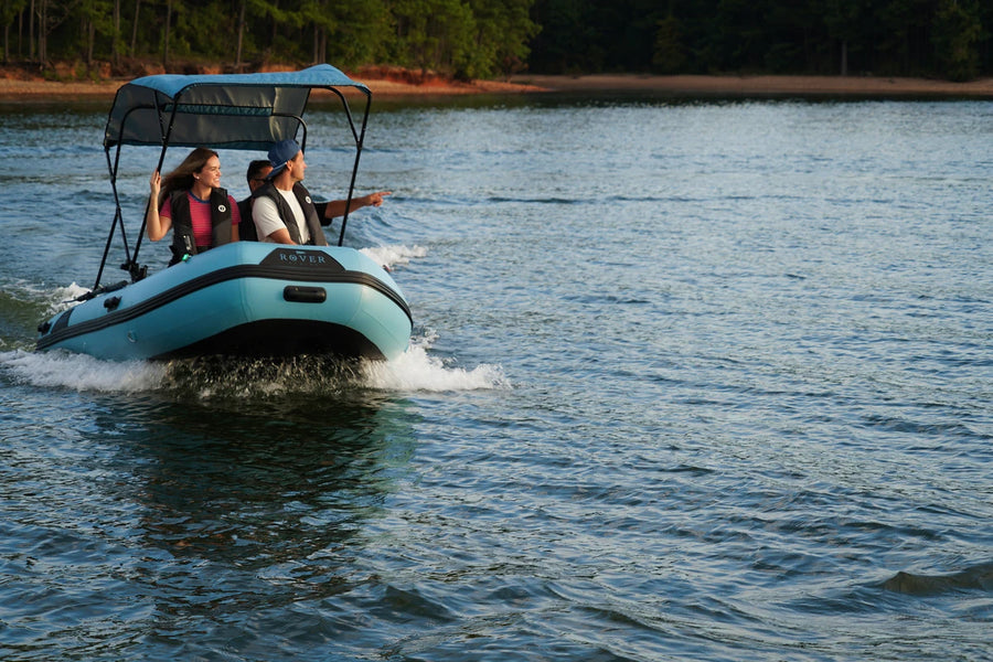 12 ft Rover Marine Battle Boat with a Yamaha outboard cruising on the lake