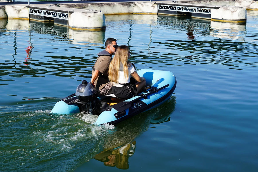 8 ft Rover Marine Battle Boat with a small gas outboard leaving the marina docks