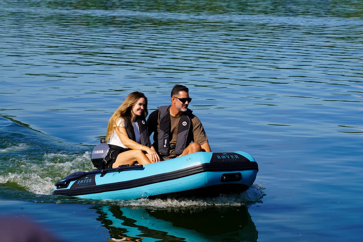 8 ft Rover Marine Battle Boat under power on a sunny lake day