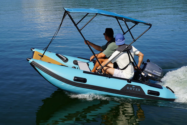 10 ft Rover Marine Battle Cat inflatable catamaran cruising on a lake