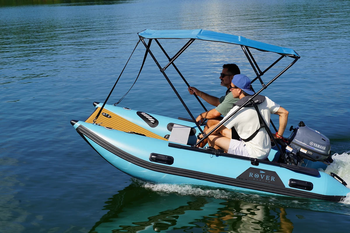 10 ft Rover Marine Battle Cat under power with two people aboard