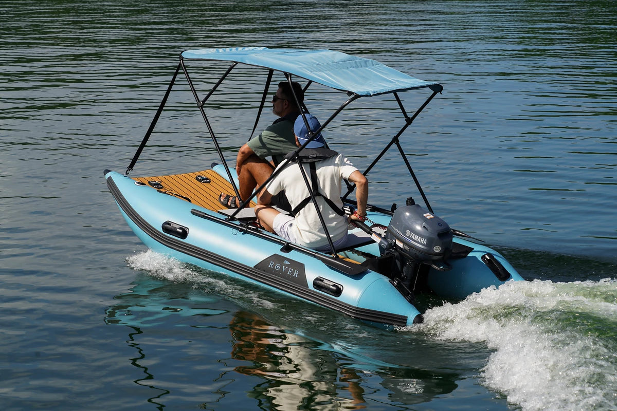 10 ft Rover Marine Battle Cat cruising past a forested shoreline
