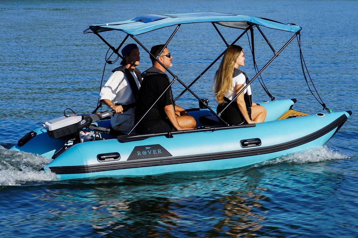 12 ft Rover Marine Battle Cat with a Torqeedo outboard and Bimini on the lake