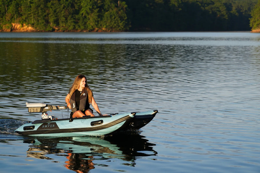 8 ft Rover Marine Battle Cat cruising solo on a calm lake