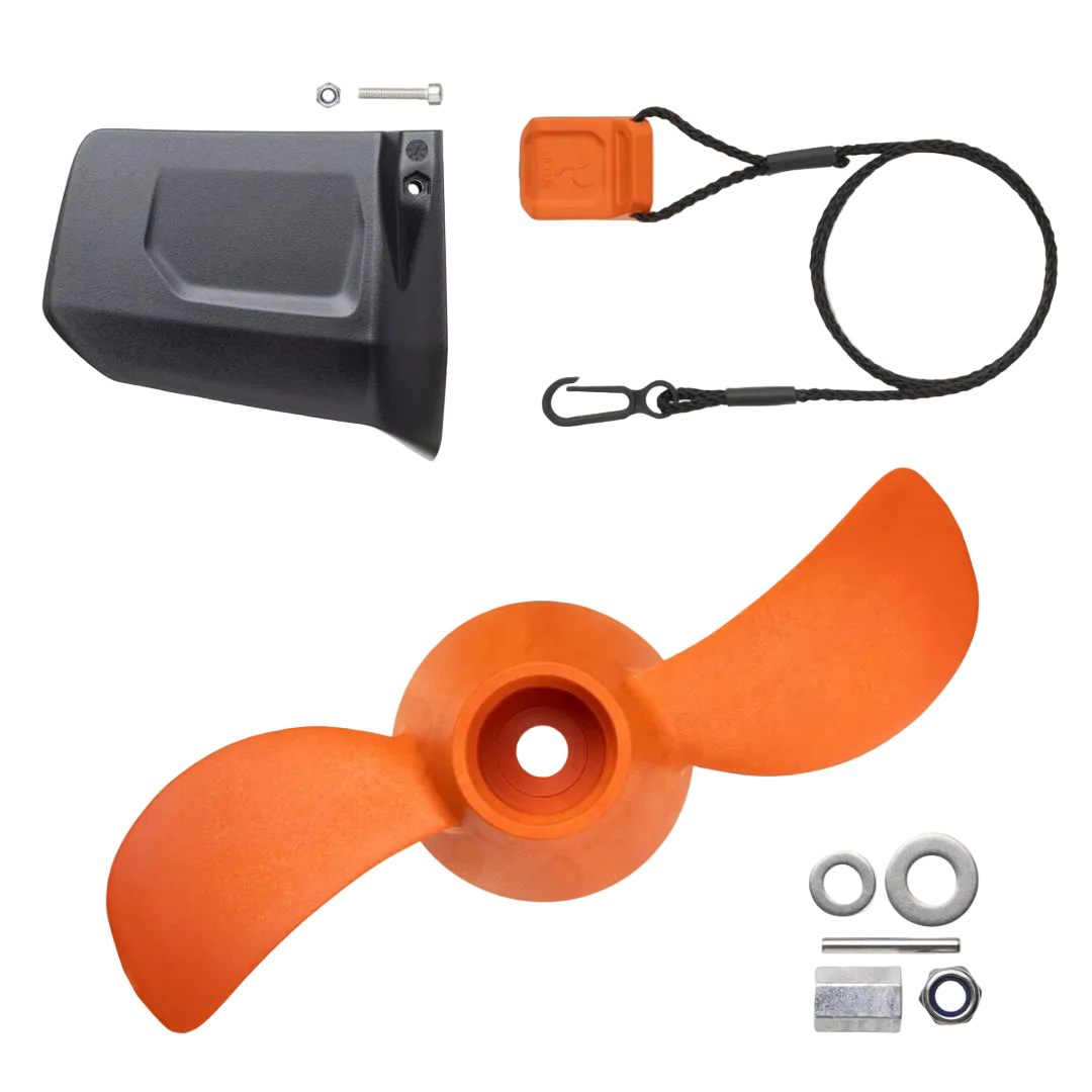 Collection of boat propeller parts including a propeller, cover, and accessories on a white background.